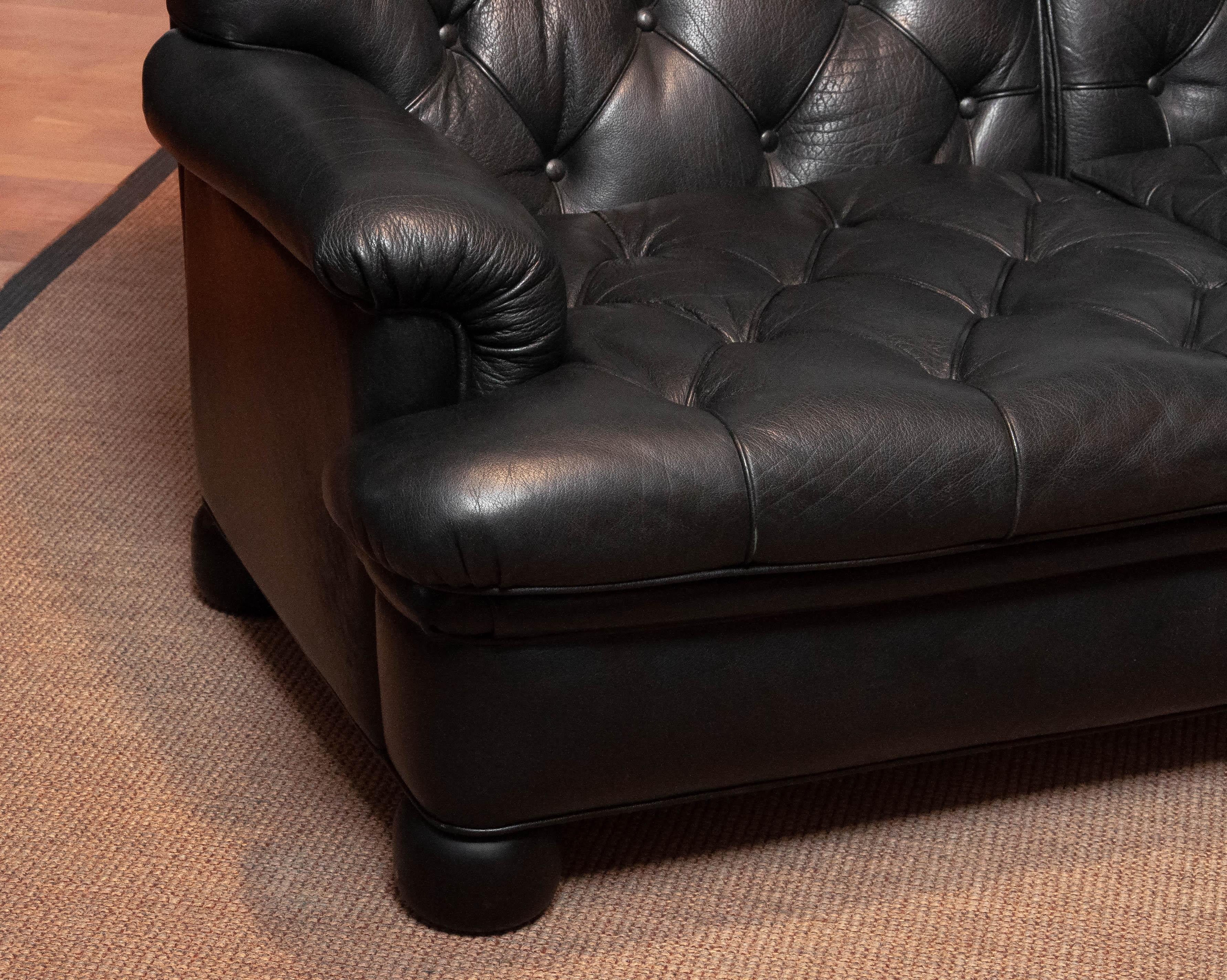 1960 Canapé en cuir noir rembourré modèle 