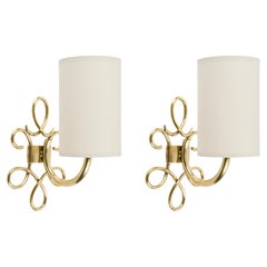 1960 Pair of “Boucle” wall lights in gilded brass Maison Honoré