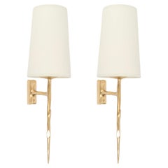 1960 Pair of bronze wall lights by Félix Agostini for Maison Arlus