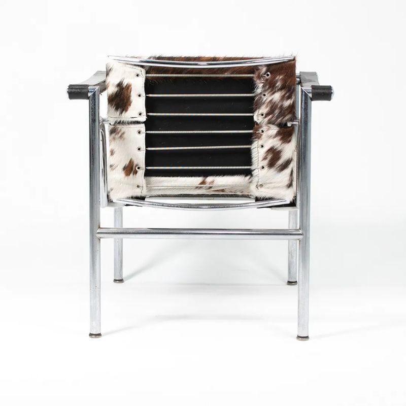 1960 Pair of LC1 Basculant Chair in Cowhide by Perriand Jeanneret & Le Corbusier In Good Condition In Philadelphia, PA
