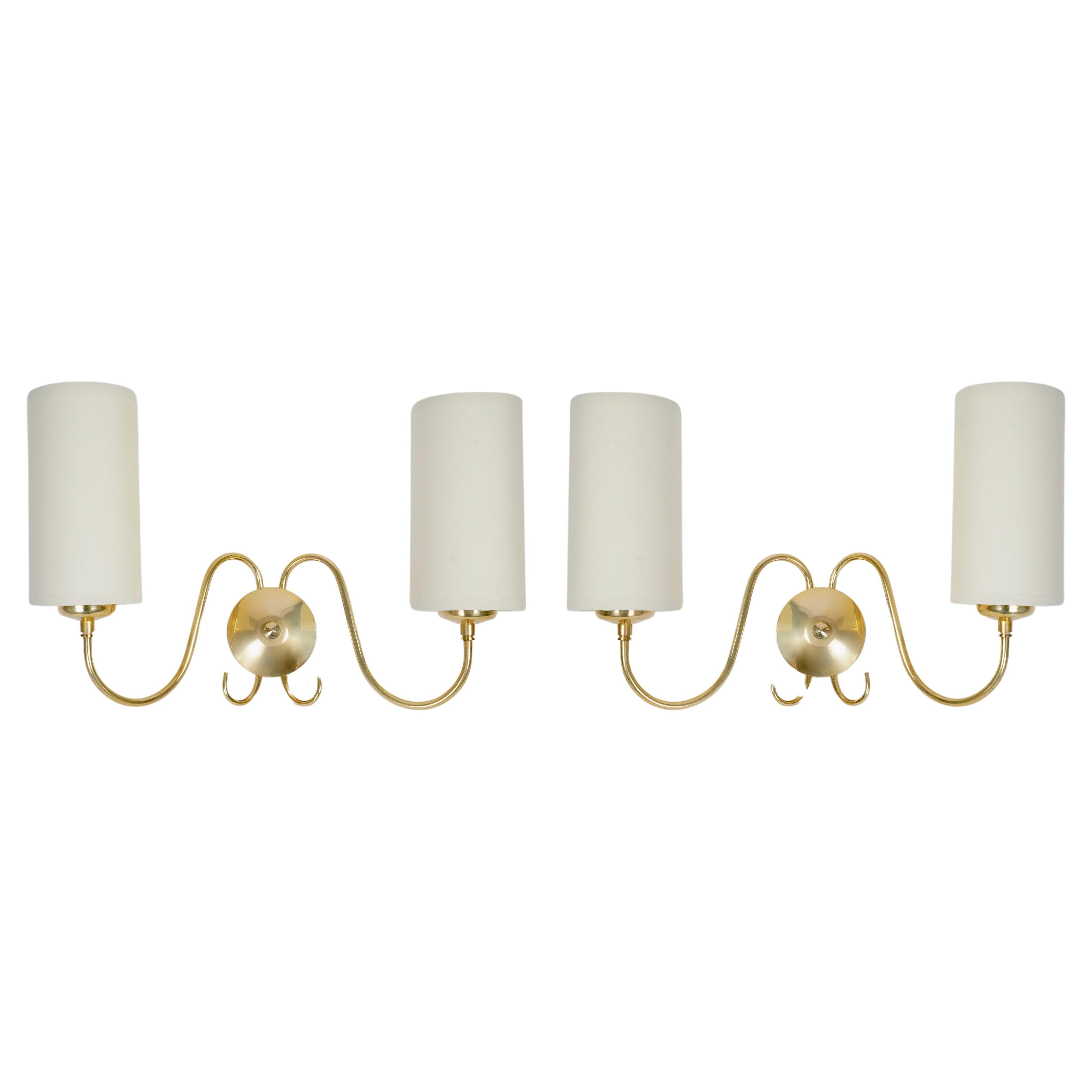 1960 Pair of Maison Honoré gilded brass wall lights For Sale