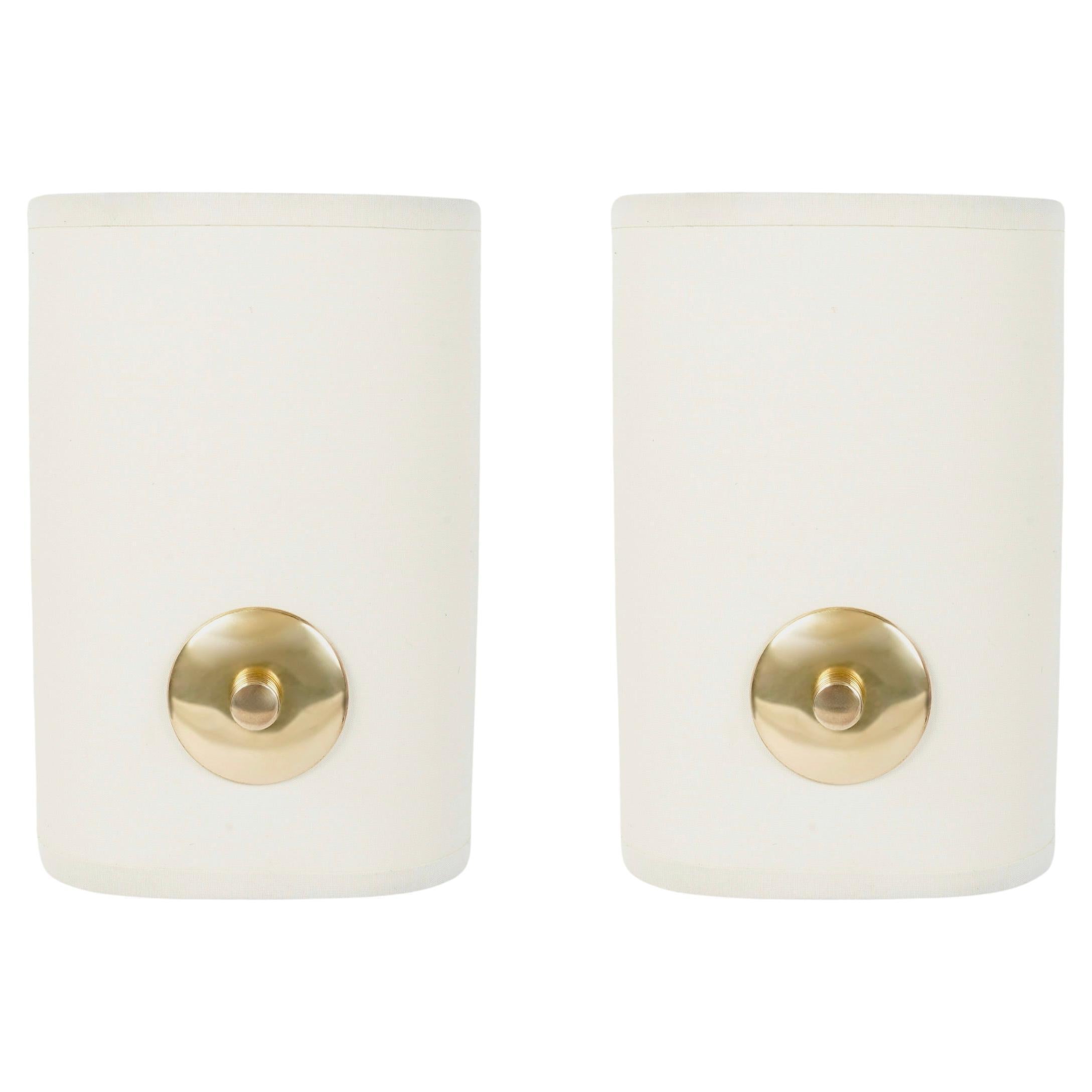 1960 Pair of Maison Honoré wall lights For Sale