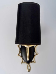 1960 Pair of medallion sconces by Maison Honoré