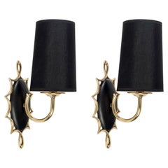 1960 Pair of medallion sconces by Maison Honoré