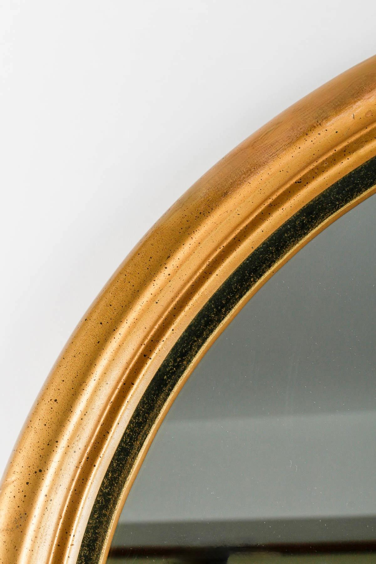 French 1960 Pair of molded and gilded wood mirrors inspired by a Romanesque ogive.