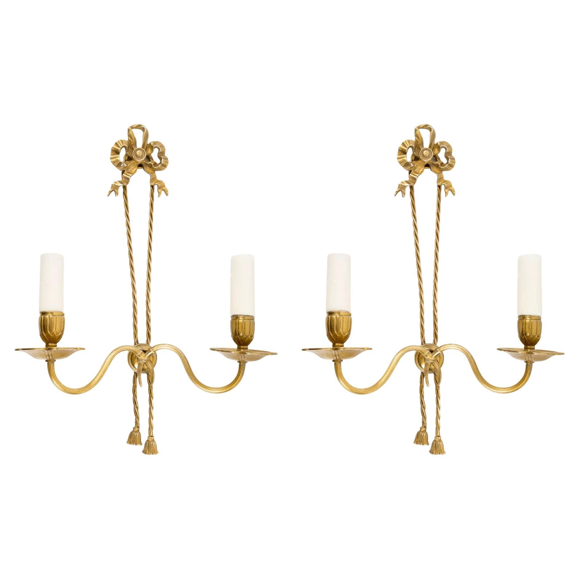 1960 Pair of neo-classical gilt bronze wall lamps by Lucien Gau