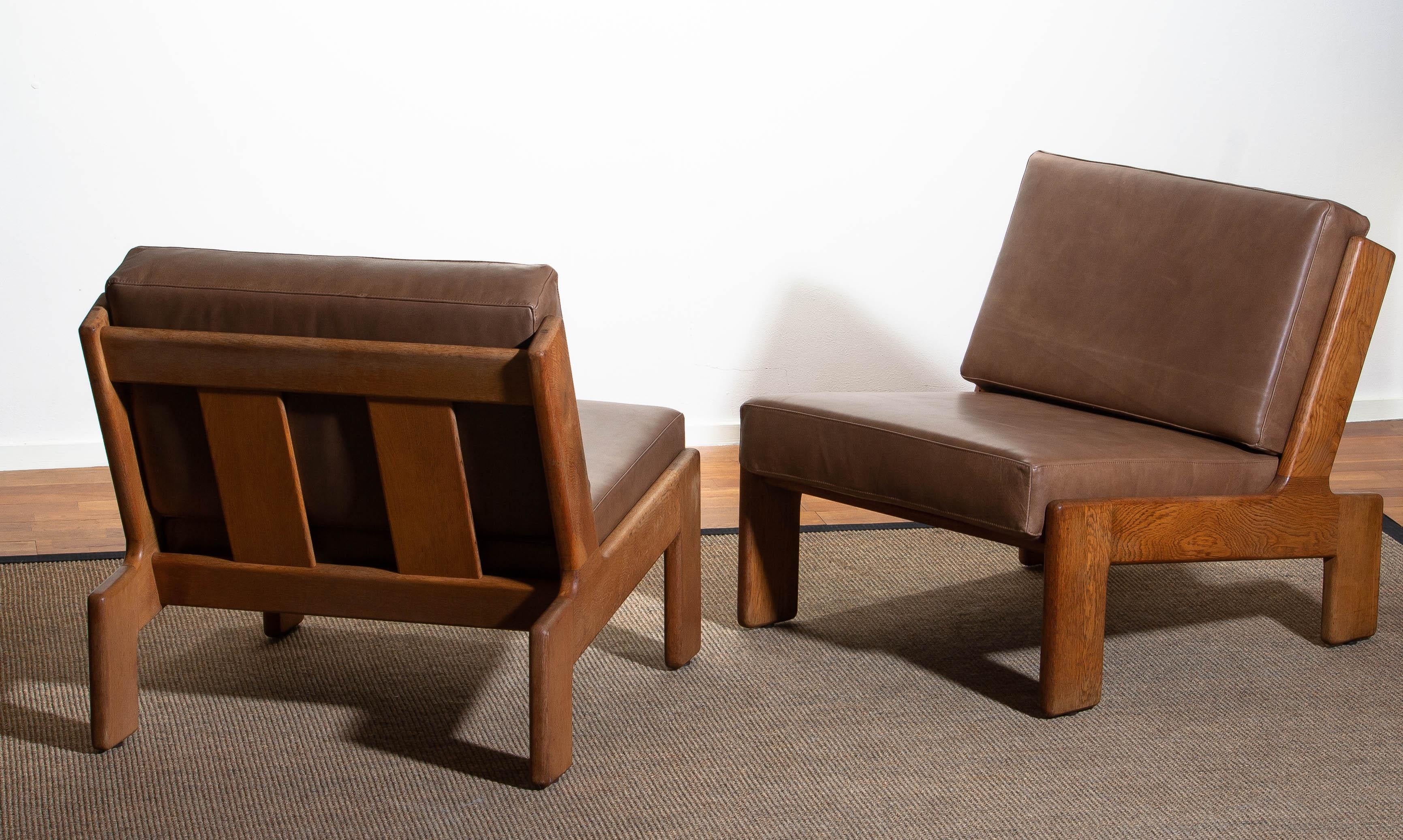 Finnish 1960, Pair of Oak and Leather Cubist Lounge Chairs by Esko Pajamies for Asko