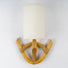 1960  Pair of rattan sconces by Louis Sognot