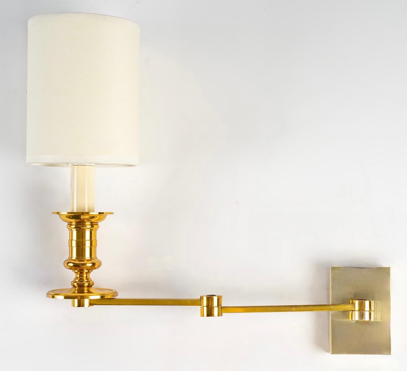 French 1960, Pair of Sconces with Pivoting Arm in Gilded Bronze by Maison Jansen For Sale