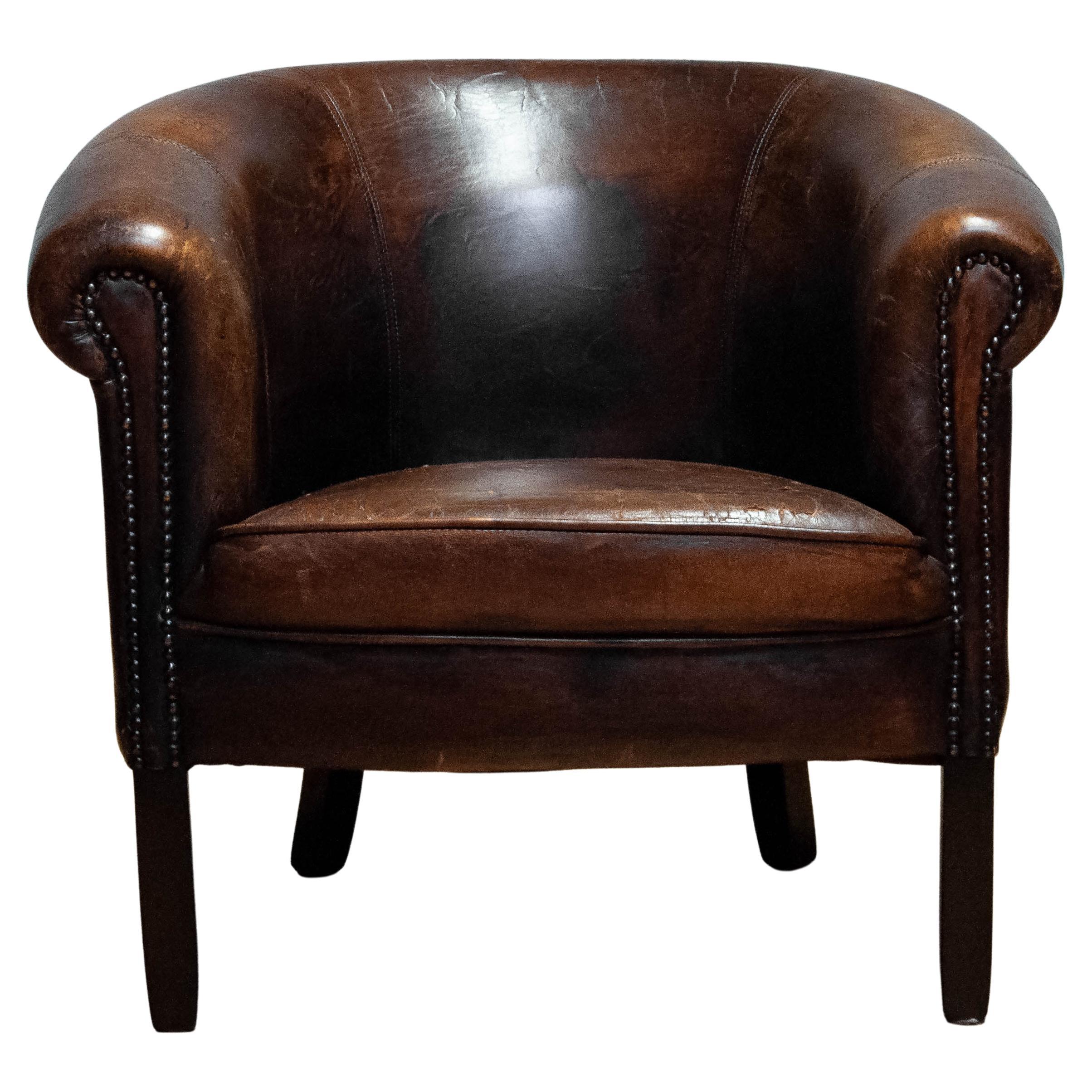 1960 Patinated Dark Brown Dutch Colonial Sheepskin Upholstered Lounge Club Chair For Sale