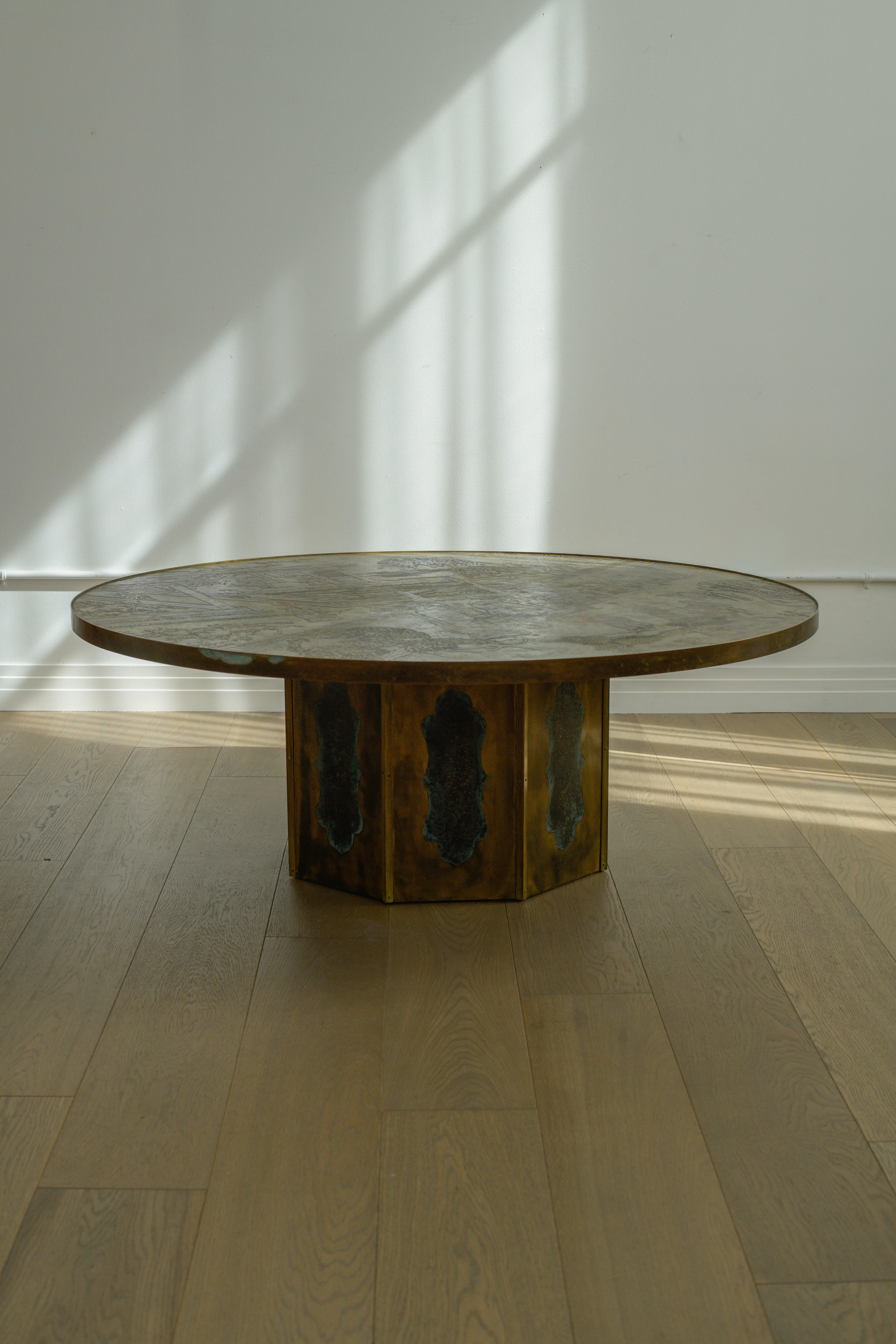1960 Philip and Kelvin Laverne Chan Circular Coffee Table in good vintage condition. Tabletop has a beautiful patina with many color accents throughout. Some areas of verdigris are present on the tabletop's edge. Overall presents beautifully and is