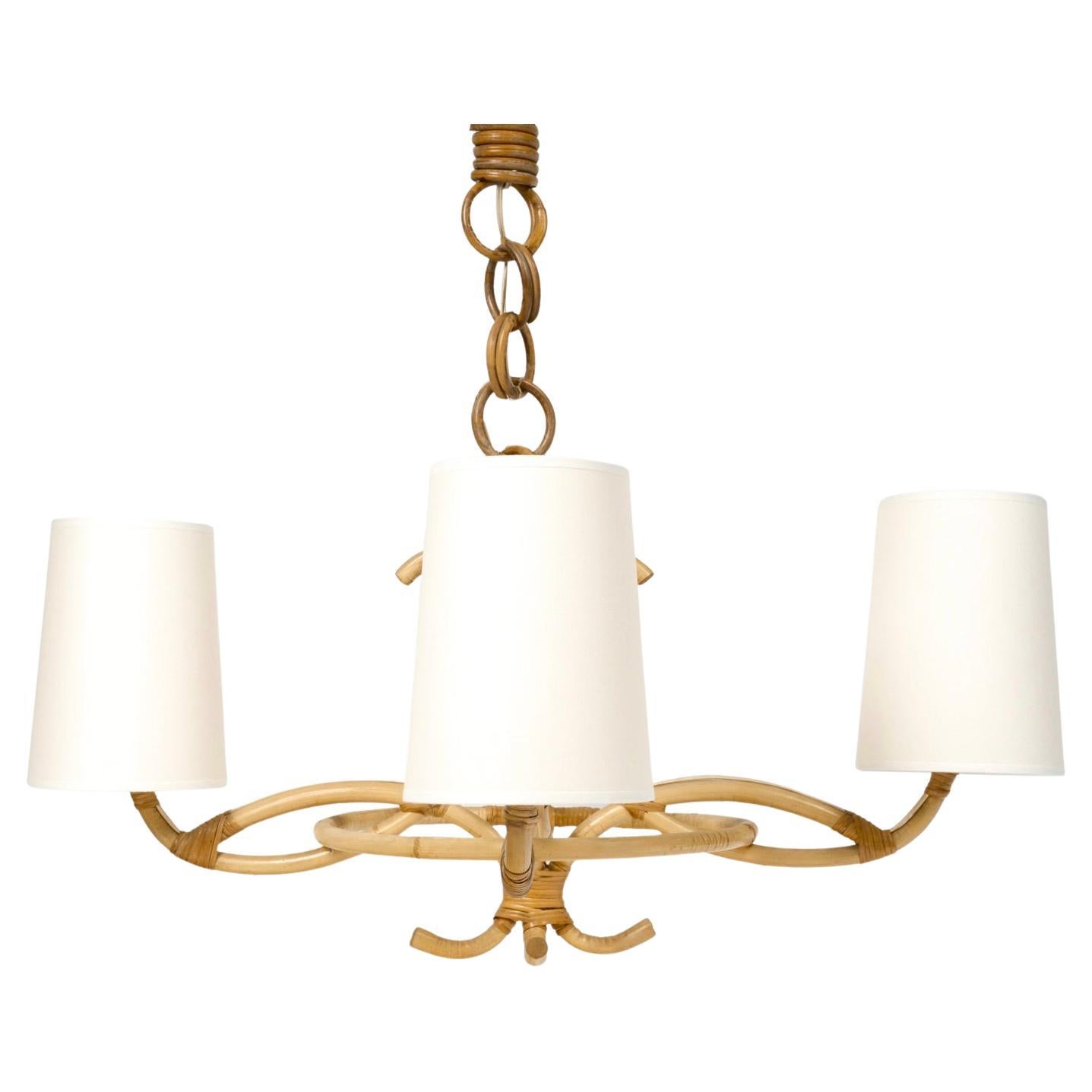 1960 Rattan chandelier by Louis Sognot For Sale