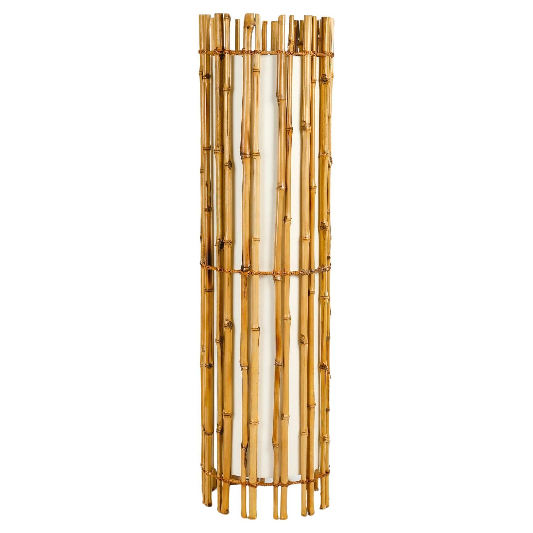 1960 Rattan floor lamp by Louis Sognot For Sale