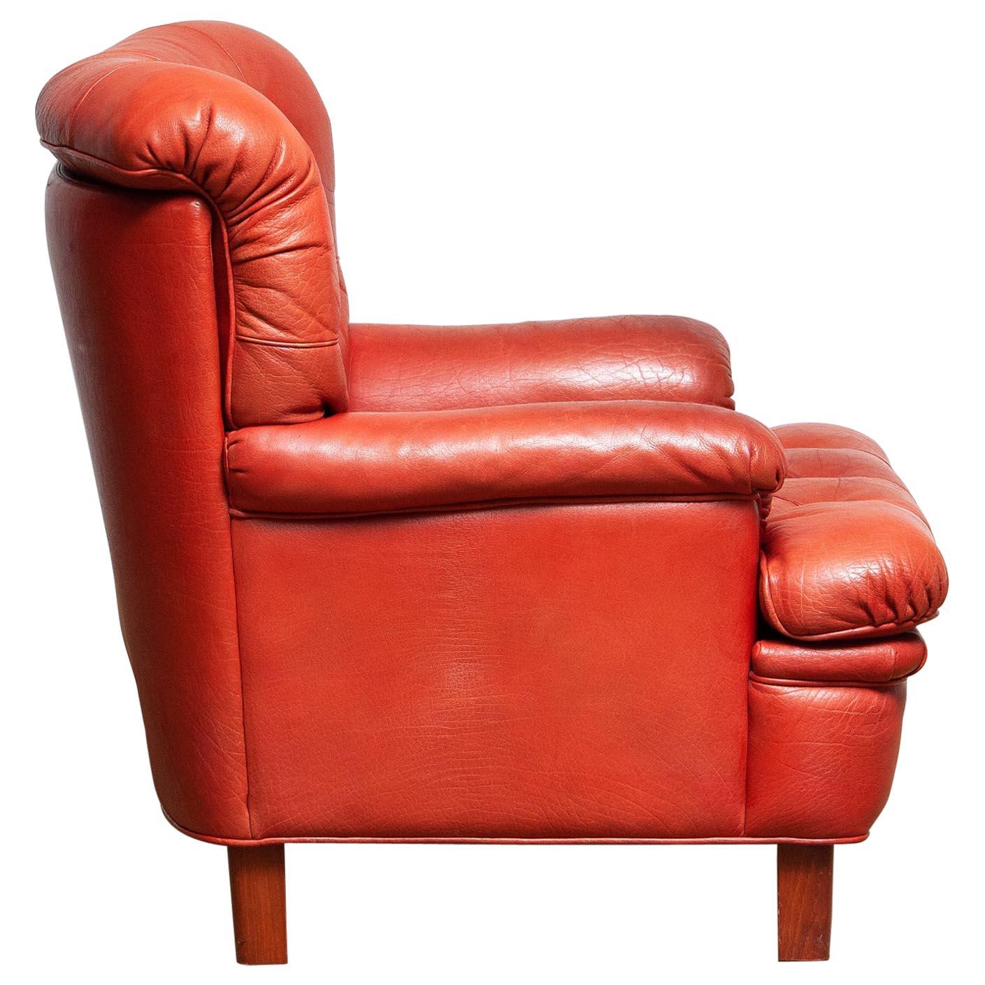 Extremely beautiful 1960s buffalo leather and quilted rare easy or lounge or armchair designed by Arne Norell for AB Norell in Solna in Sweden. This chair is very comfortable and the overall condition is good.