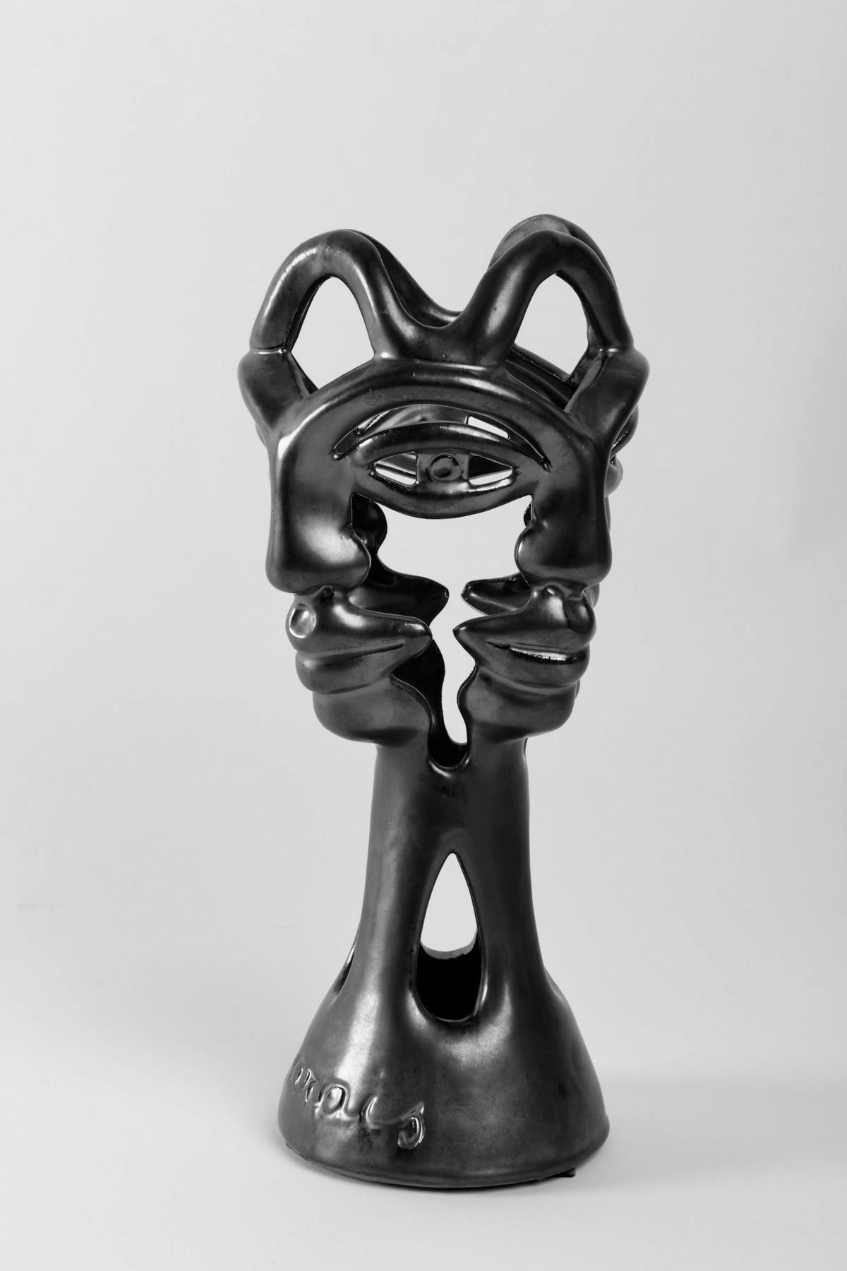 Black enameled ceramic vase designed by Jean Marais, model “4 Faces”, inspired by Jean Cocteau.
Signed Jean Marais (1913-1998) Vallauris,