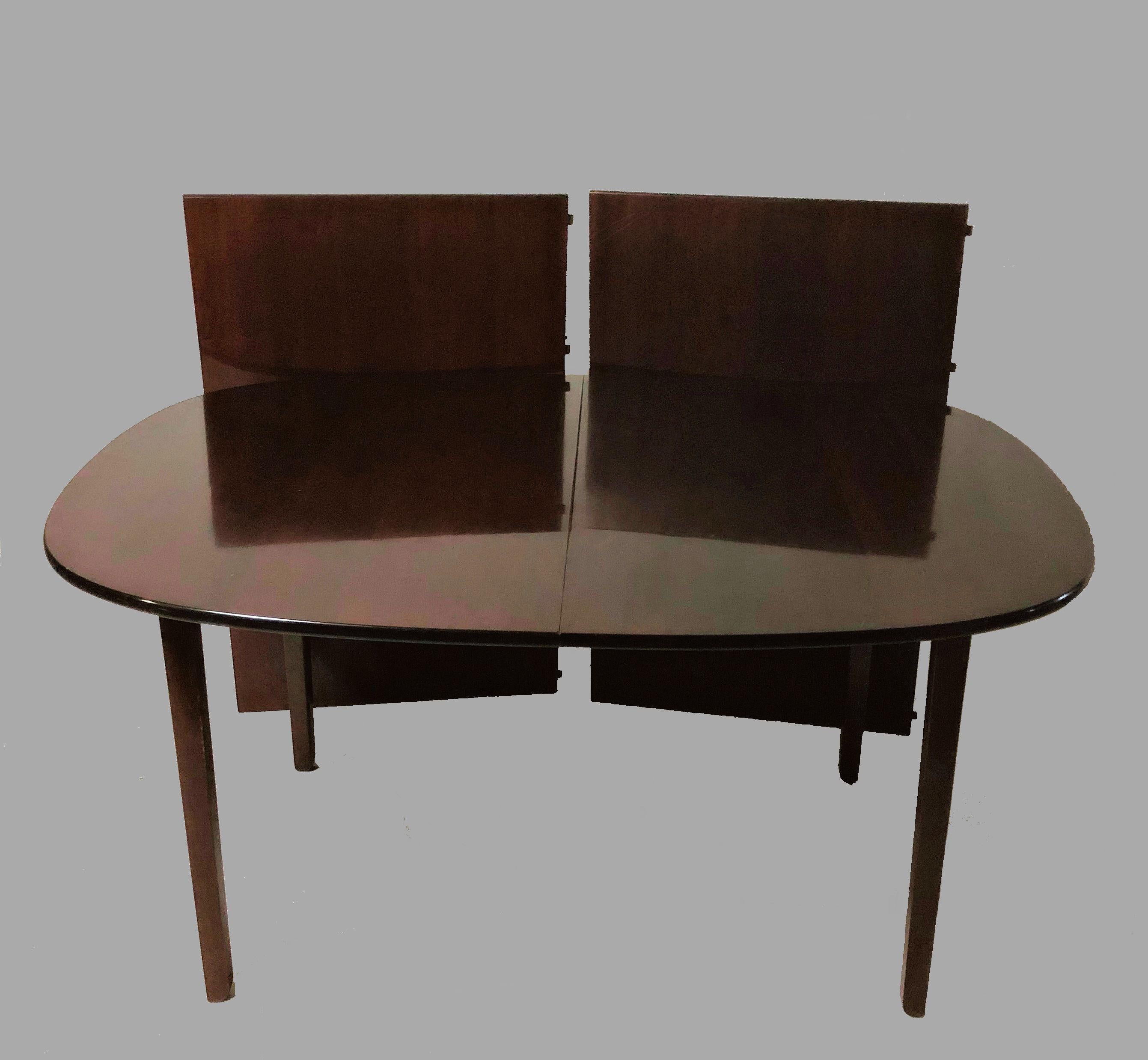 Expandable Ole Wanscher Rungstedlund dining table with two extra leaves by P. Jeppesen.

The dining table has been checked and refinished by our cabinetmaker and is in good condition.

Seizes cm./inch:
Dining table: H 73 / 28.74, W 155 /61 D 106 /
