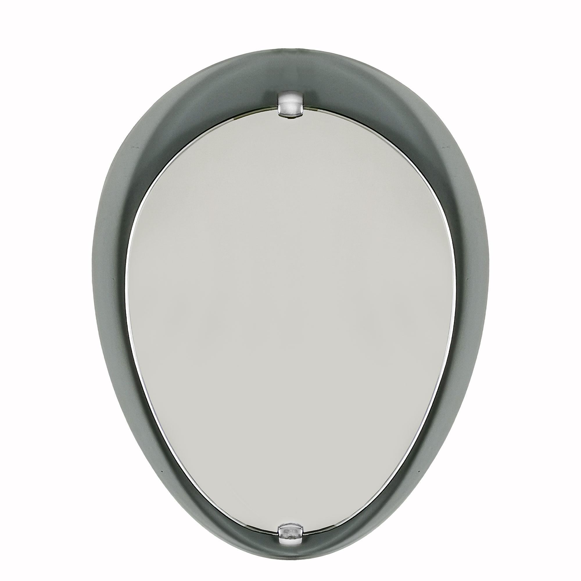 Oval mirror with a beveled and thick smoked gray glass back, over it a beveled mirror fixed by polished aluminum decoration.

Italy c. 1960.