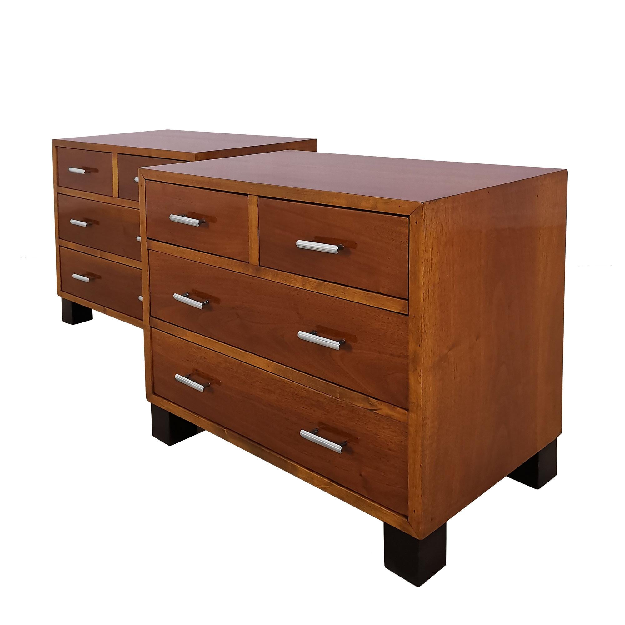 Pair of large night stands, solid wood and light walnut veneer and black stained feet, French polish. Nickel plated metal handles.

Spain, circa 1960.
