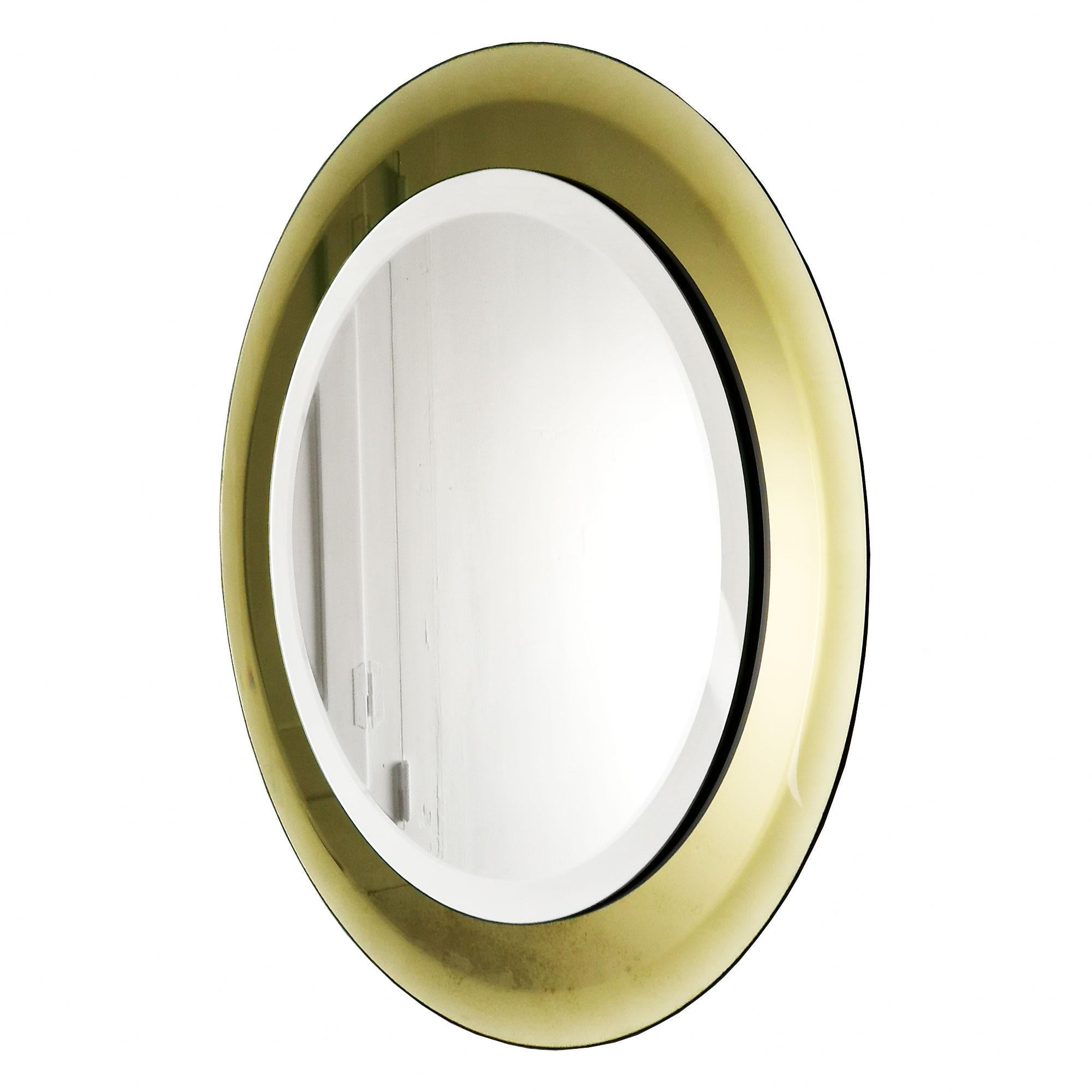 Round beveled mirror with a golden yellow beveled mirror frame.

Italy c. 1960.