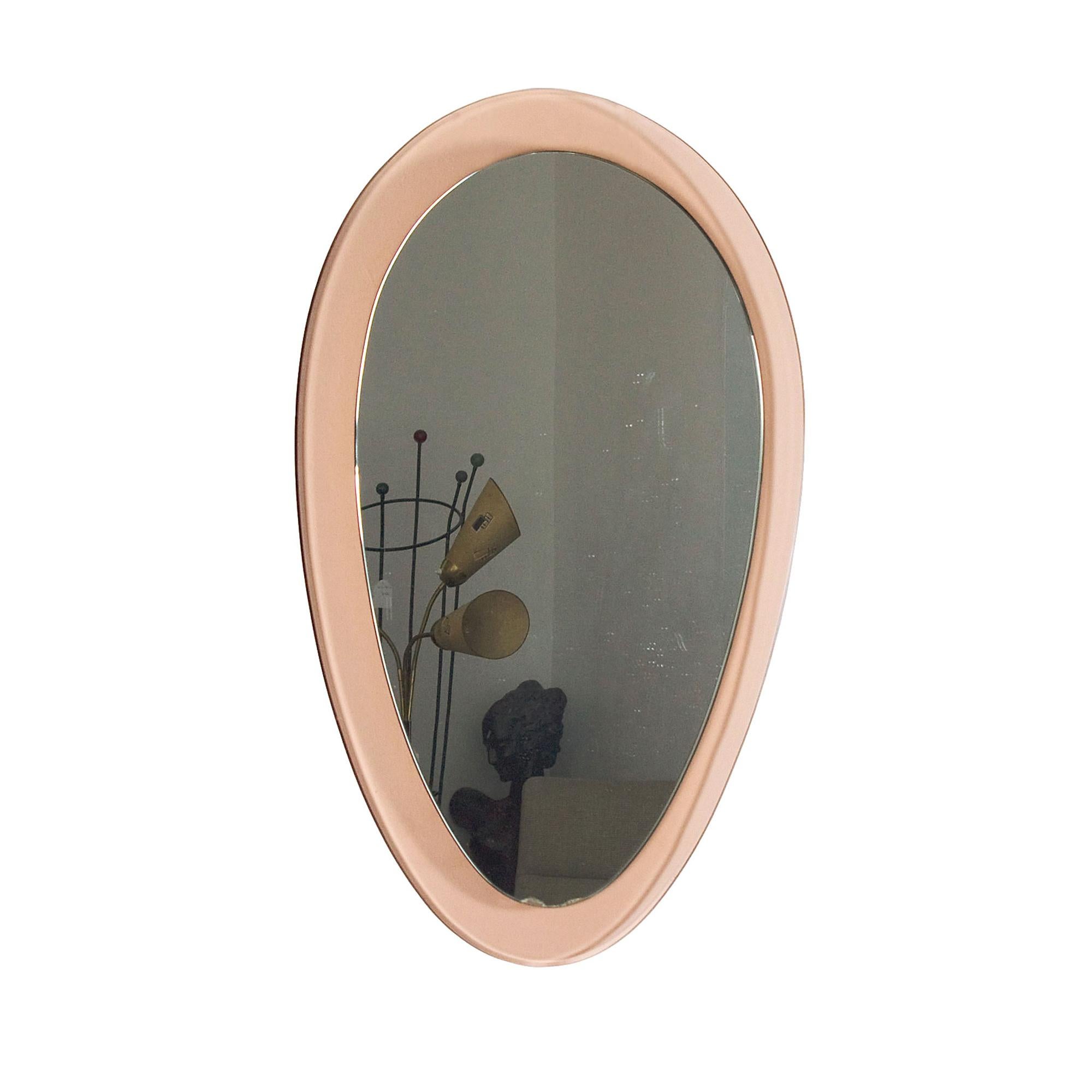 Rounded triangular mirror with a light pink transparent glass frame. Original oxidation.

Italy, c. 1960.