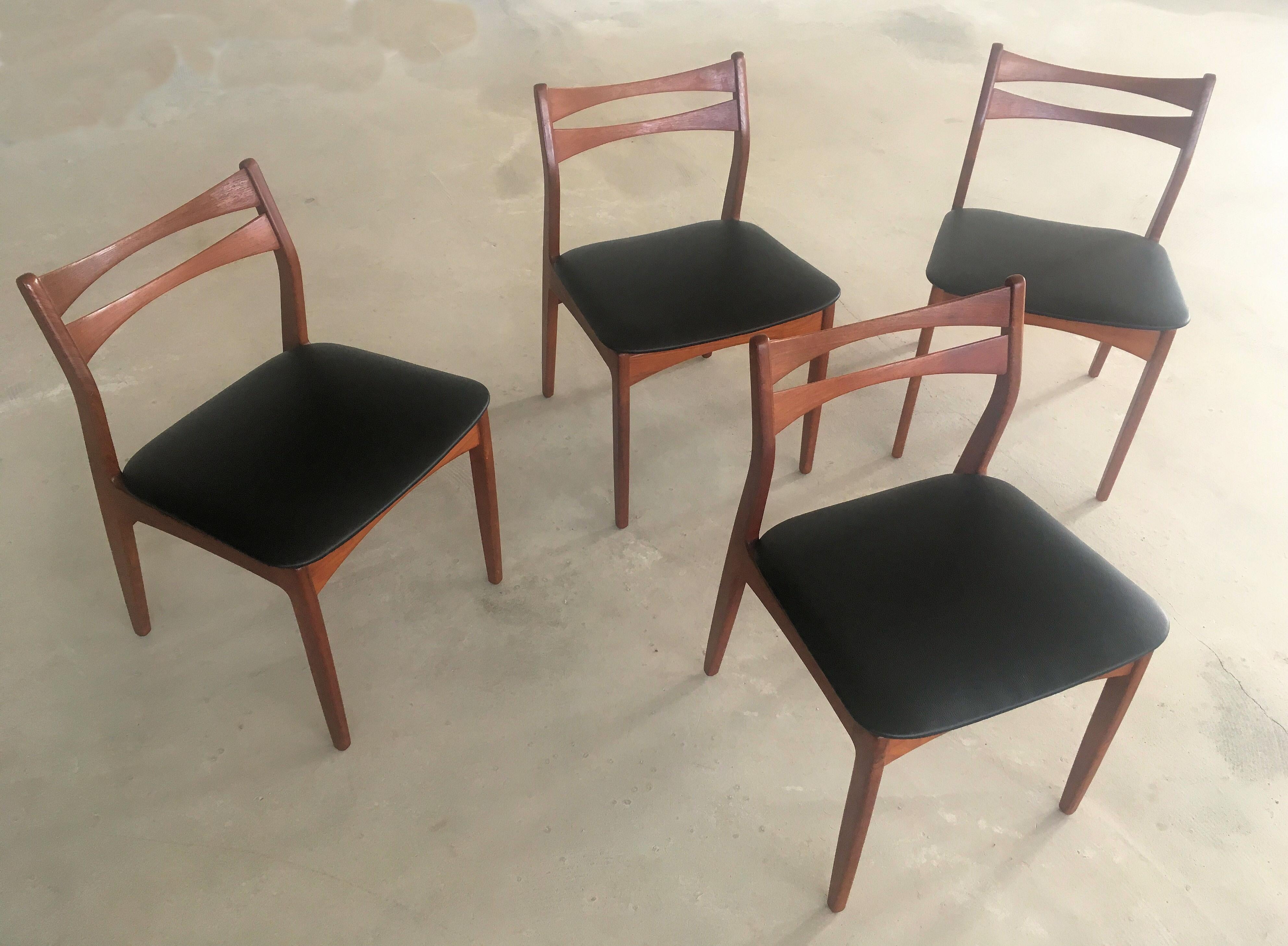 Set of four Danish teak dining chairs from the 1960s

The well designed set has been restored and refinished by our cabinetmaker and is in very good condition and seats have been reupholstered in black faux leather.