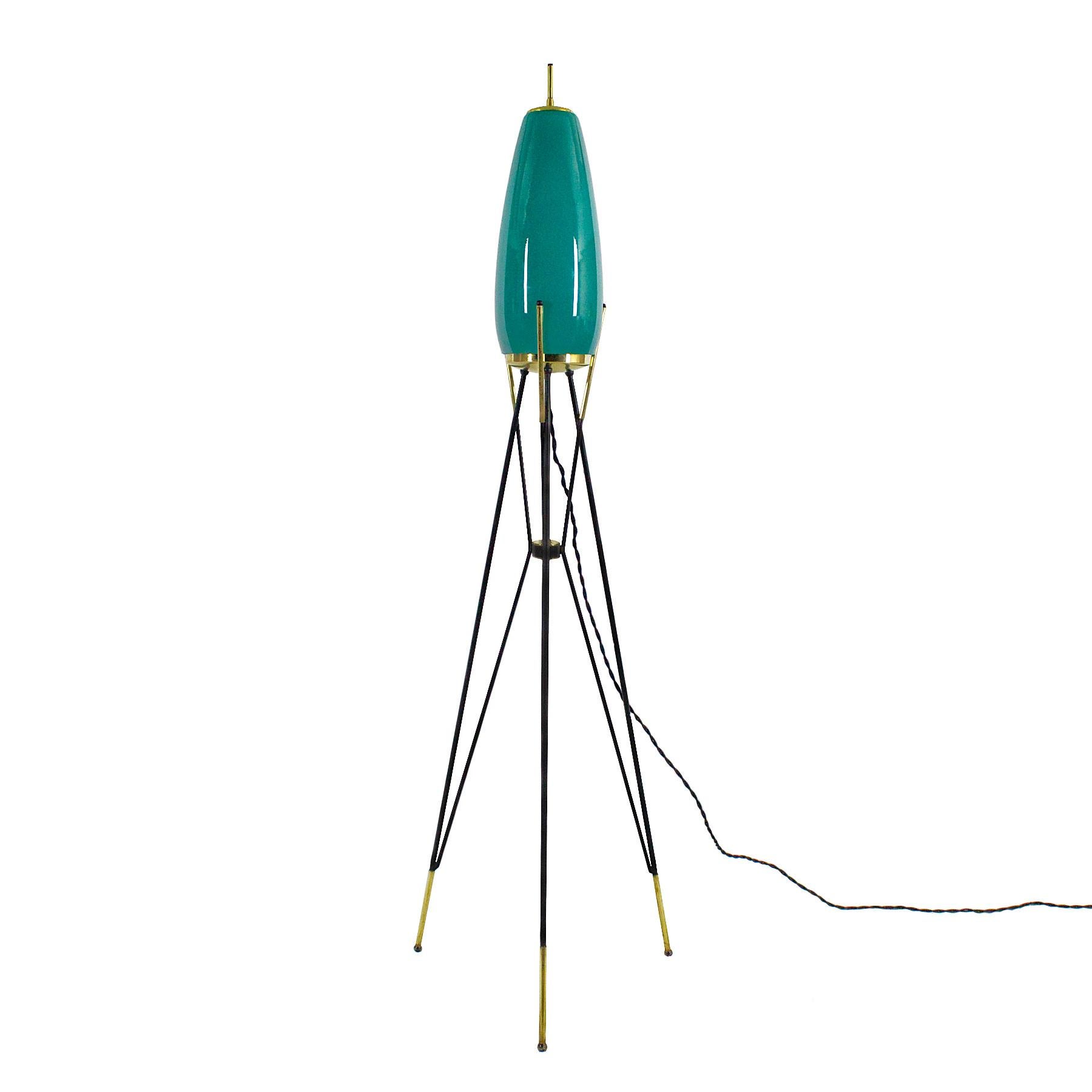 Tripod standing lamp, lacquered steel, polished brass and thick turquoise glass, new electricity.

Italy circa 1960.