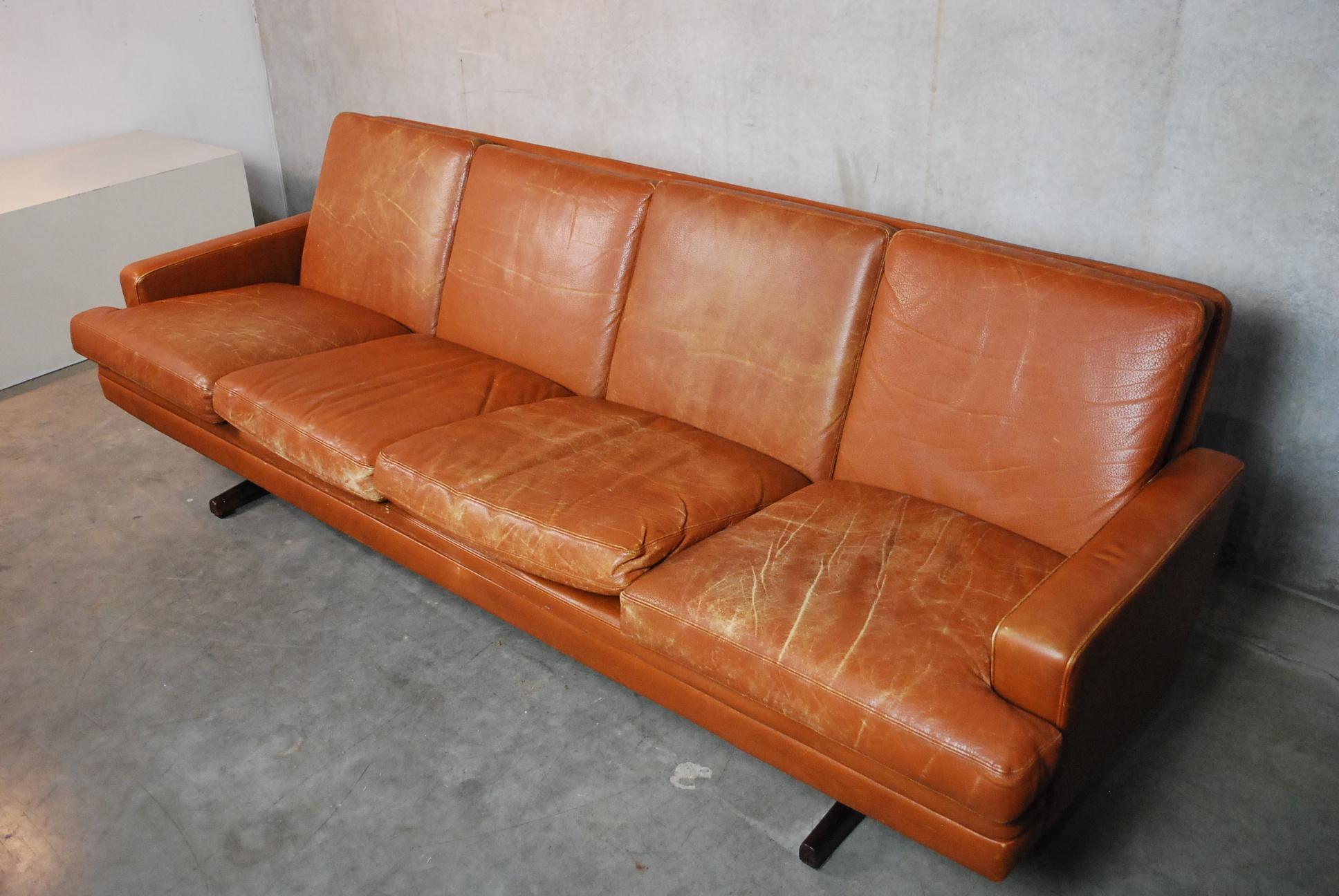 Model 807 by Fredrik Kayser for Vatne Møbler, Norway. This high-quality sofa with timeless design is upholstered in cognac colored leather with a beautiful natural patina.
The sofa rests on Shaker legs made of solid rosewood, very comfortable and