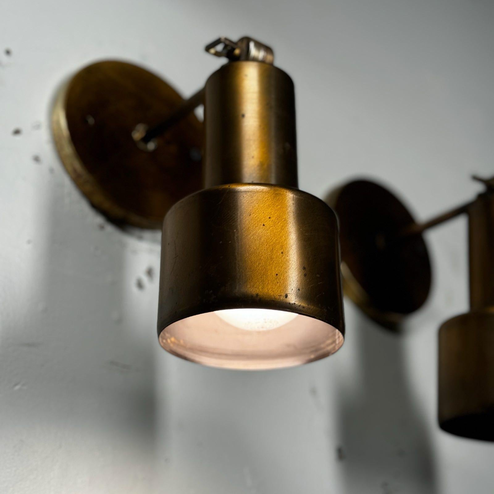 Canadian 1960 set of four brass MCM articulating sconce lights