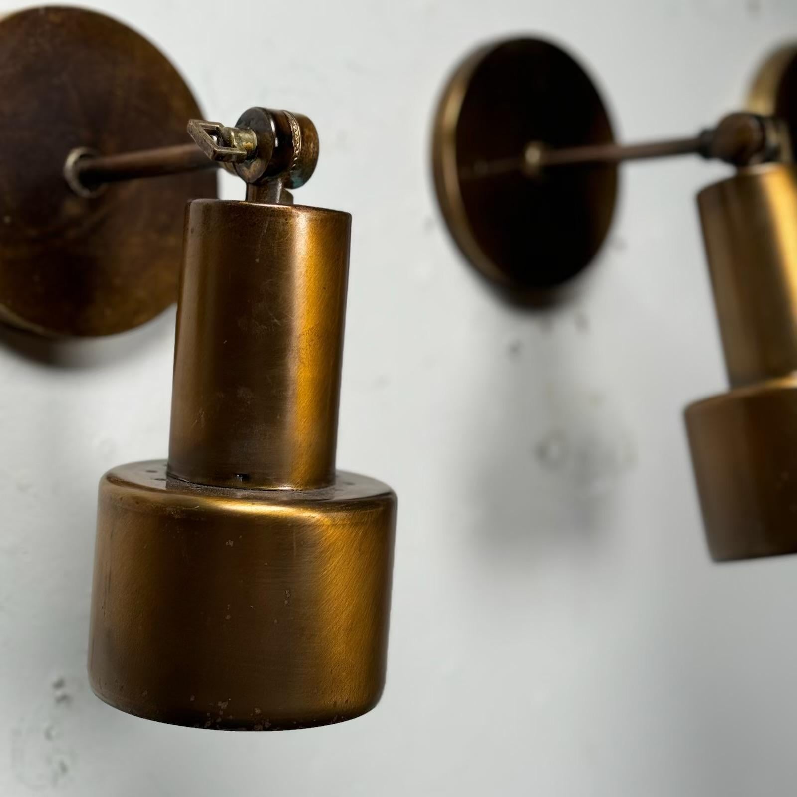 Mid-20th Century 1960 set of four brass MCM articulating sconce lights