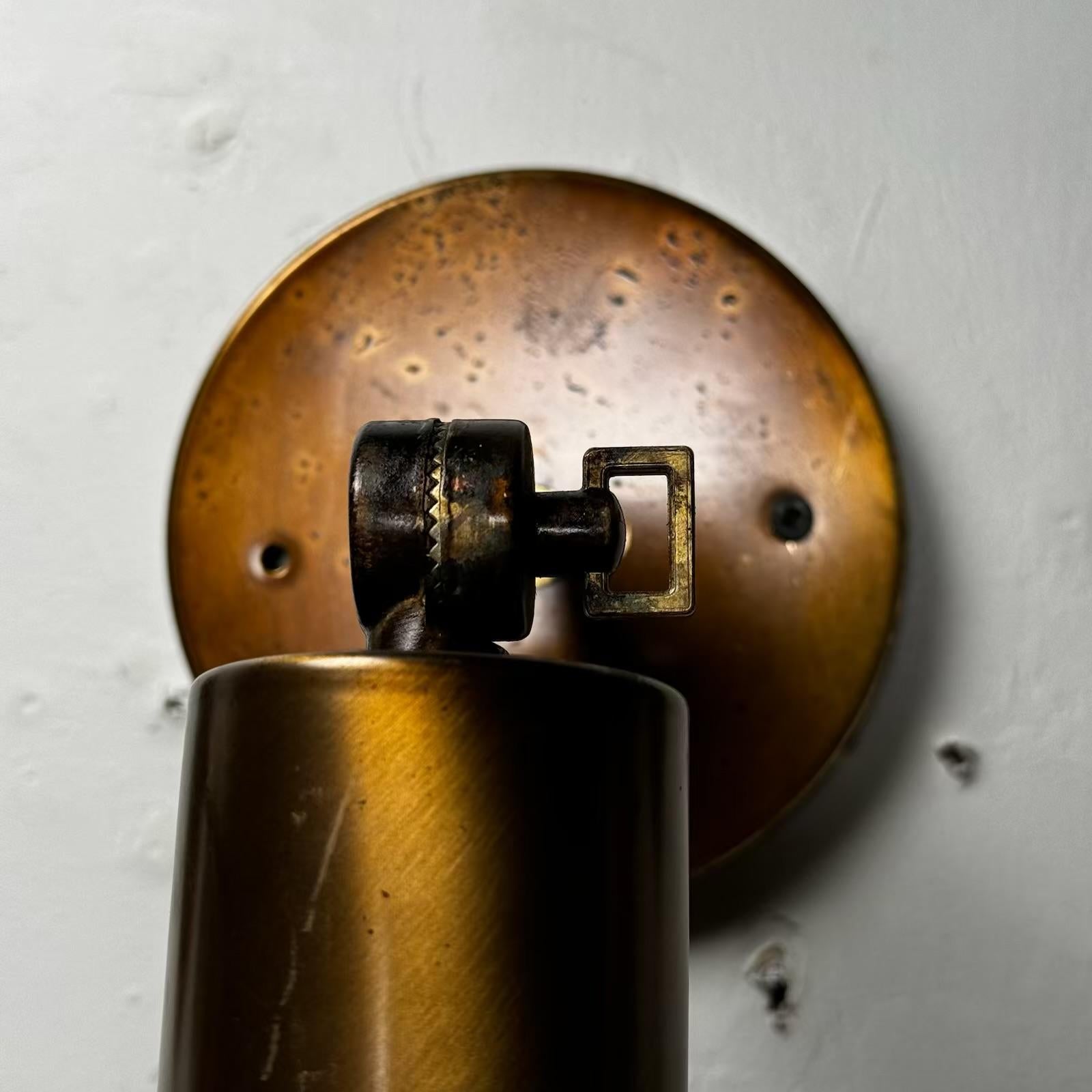 Brass 1960 set of four brass MCM articulating sconce lights