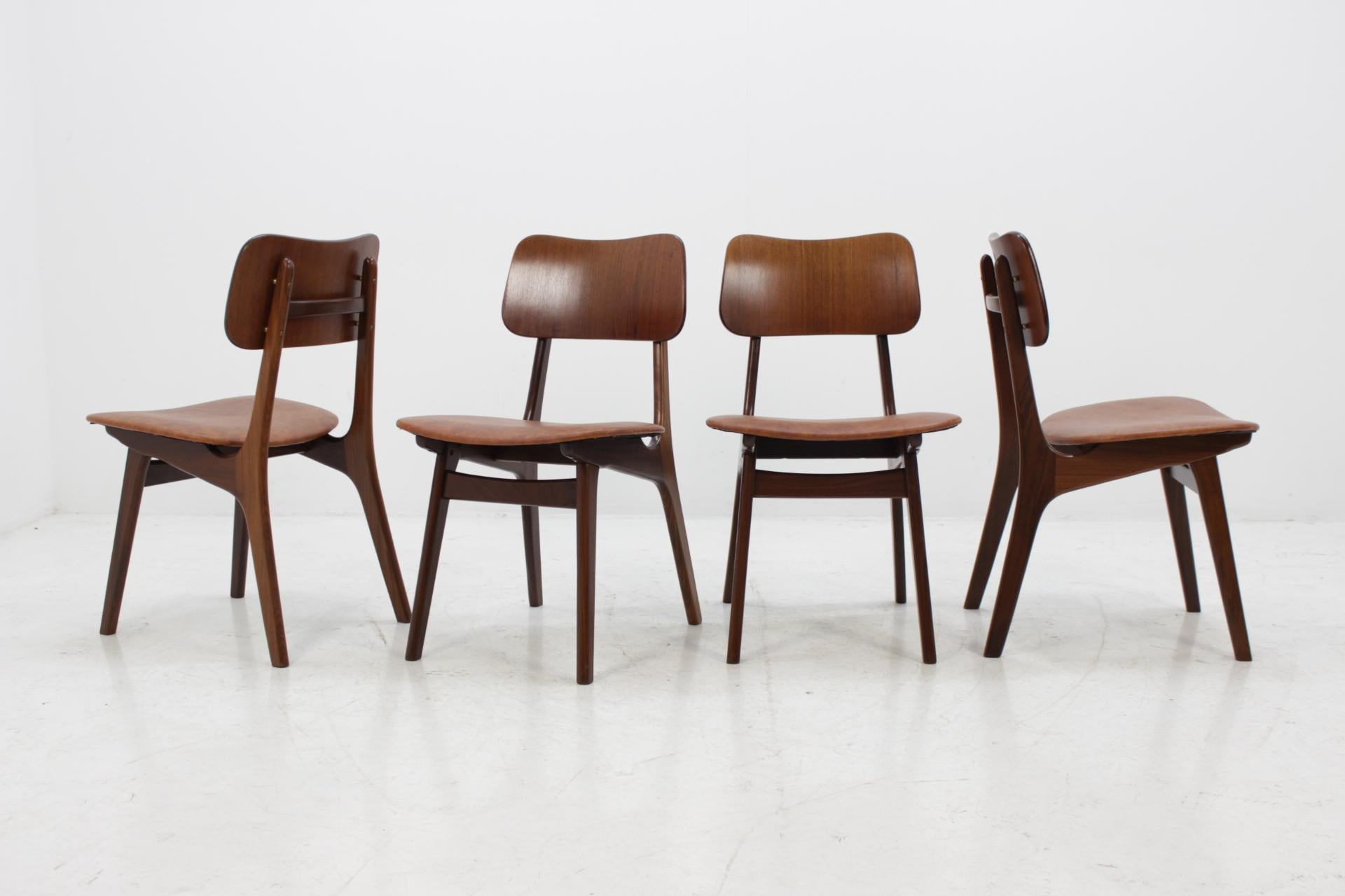 The frame of each one is made from solid teak wood. New leather upholstery. Carefully refurbished.