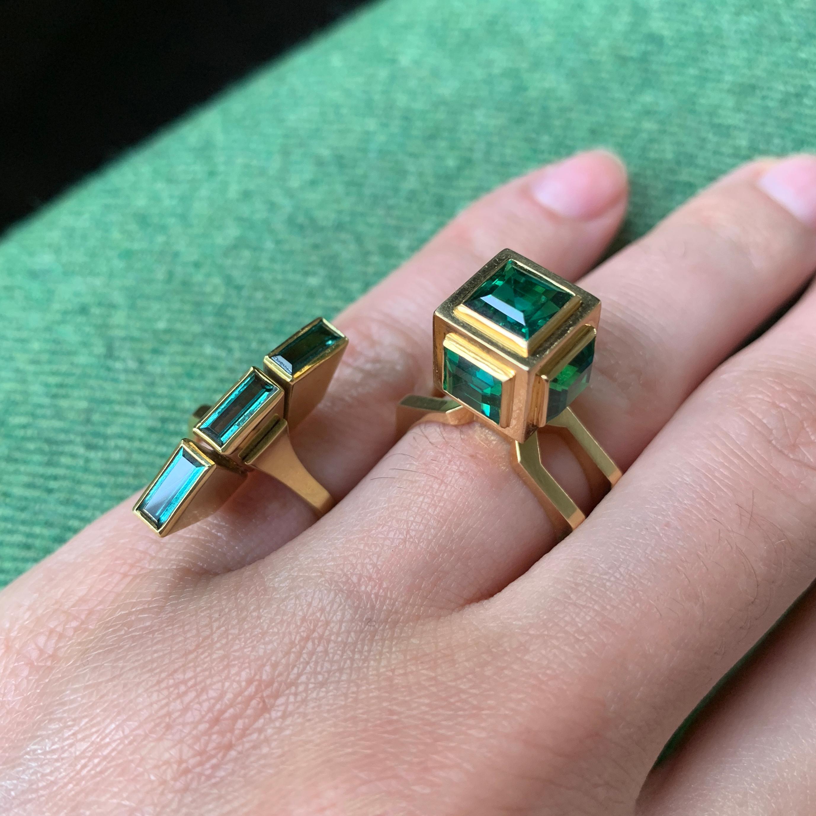 A green tourmaline and 18-karat gold cube ring with a double shank by Sweden's most prolific and famous designer, Sigurd Persson, 1960.  

He designed everything from fine jewelry to tea kettles and much more.

This ring is a size 7 stamped with the