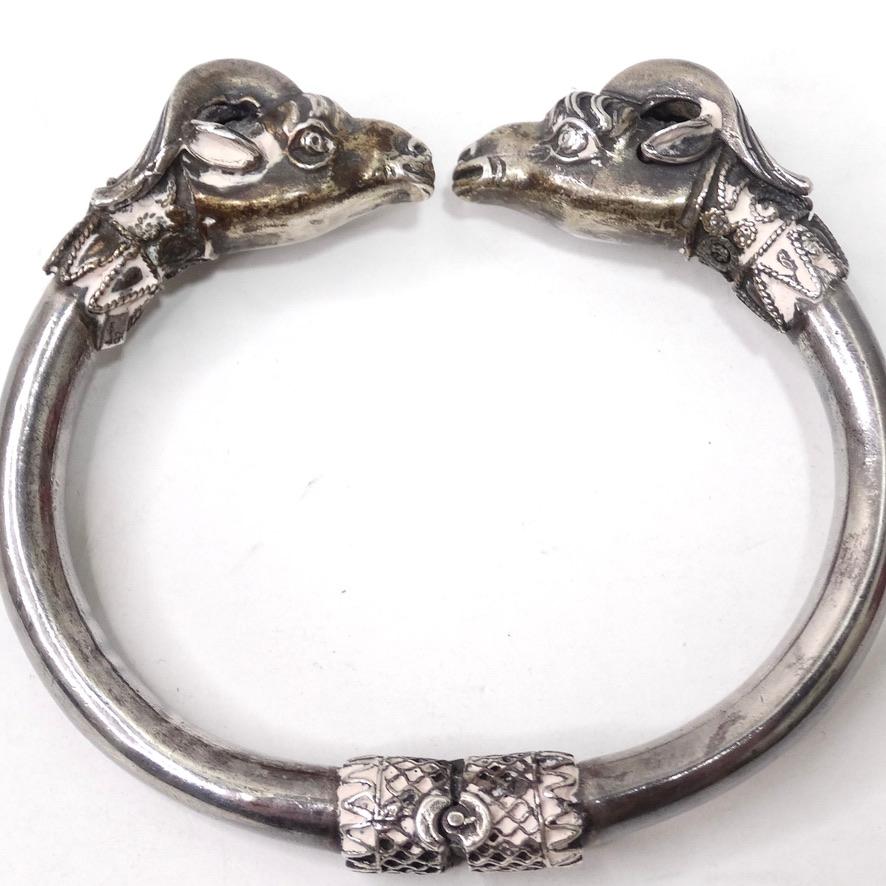 Silver double headed ram cuff style bracelet circa 1960s!  Beautiful silver cuff bracelet features a ram head on each end. Look closely and notice how intricately detailed the ram heads are, this bracelet is like it’s own wearable work of art. Style