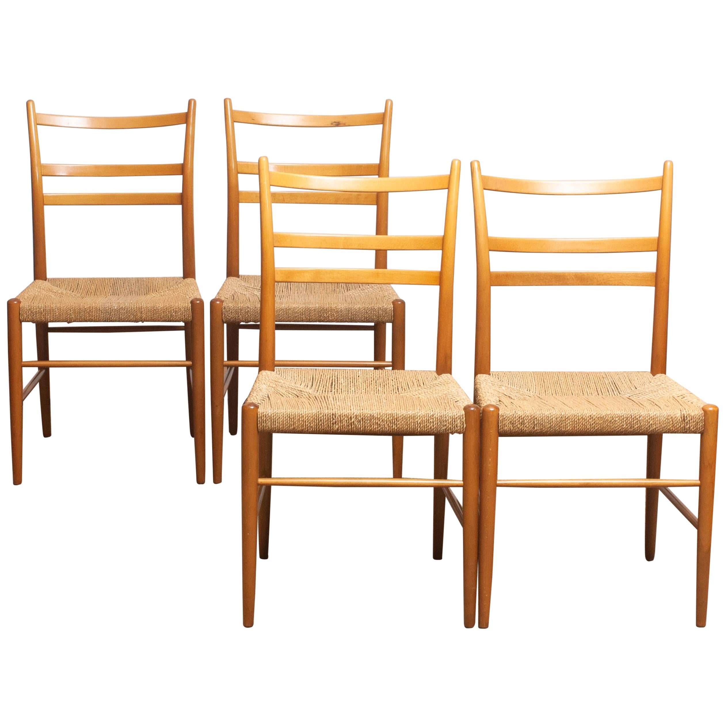 Extremely rare and beautiful set of four slim seagrass chairs in beech, model 'Gracell' designed by Yngve Ekström and manufactured by Gemla. All four chairs are in very good condition. The wicker seats are made of seagrass and are also in great
