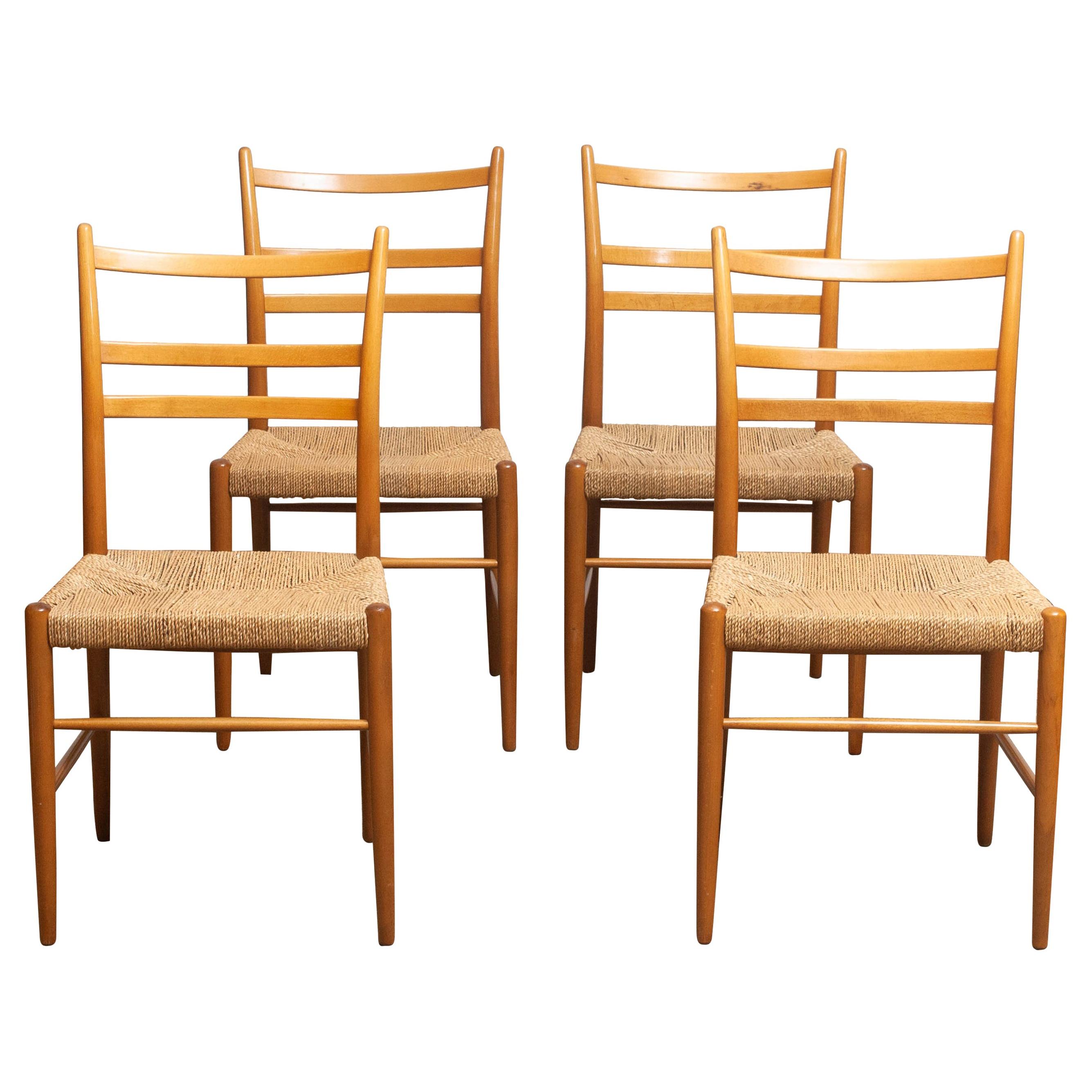Extremely rare and beautiful set of four slim seagrass chairs in beech, model 'Gracell' designed by Yngve Ekström and manufactured by Gemla. All four chairs are in very good condition. The wicker seats are made of seagrass and are also in great