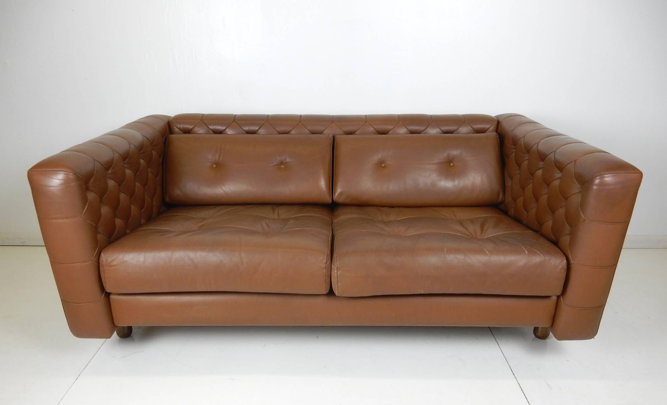 Very rare, 1960 Vico Magistretti for Cassina of Italy modernist-Chesterfield style sofa
in a luscious milk chocolate leather.
It is in excellent condition with soft foam and leather throughout.
Solid and original with not issues.
 