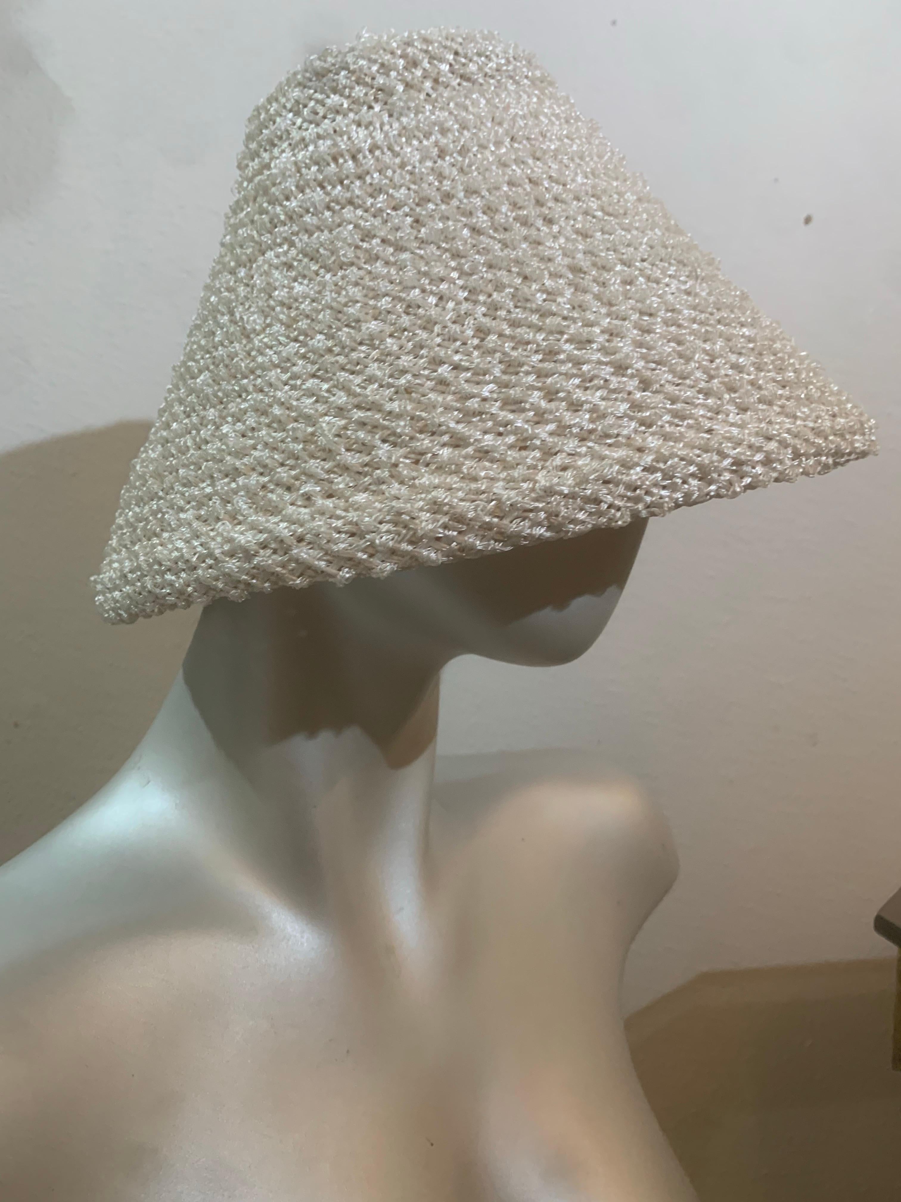 1960 White Straw Tiki-Style Sun Hat in a Simple Conical Shape:  The chicest of Italian beach hats!  Super simple construction of a stiff inner woven straw clad in white boucle-texture. With no band or definition inside, it will fit any size!  If you
