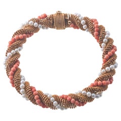 1960a Bracelet de corde torsadée en or avec perles et corail