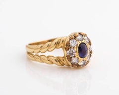 1960s 0.25 Carat Sapphire and 0.80 Carat Diamond 18 Karat Yellow Gold Ring