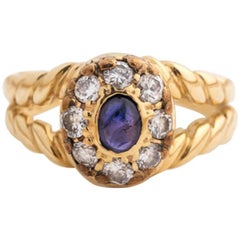 1960s 0.25 Carat Sapphire and 0.80 Carat Diamond 18 Karat Yellow Gold Ring