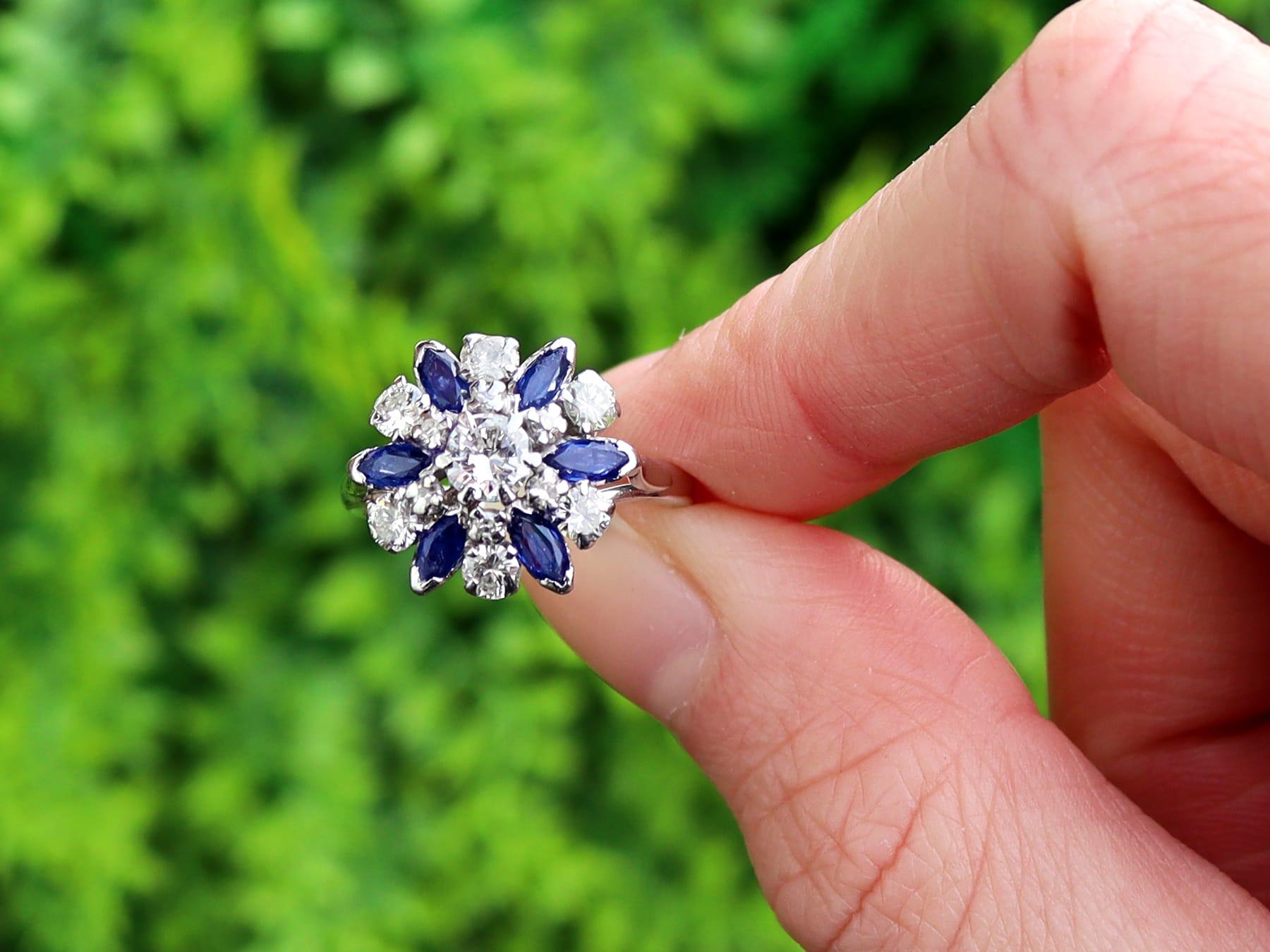 A stunning, fine and impressive vintage 1.10 carat natural blue sapphire and 1.20 carat diamond, 18 karat white gold, platinum set cluster ring; part of our vintage jewelry and estate jewelry collections.

This stunning, fine and impressive vintage