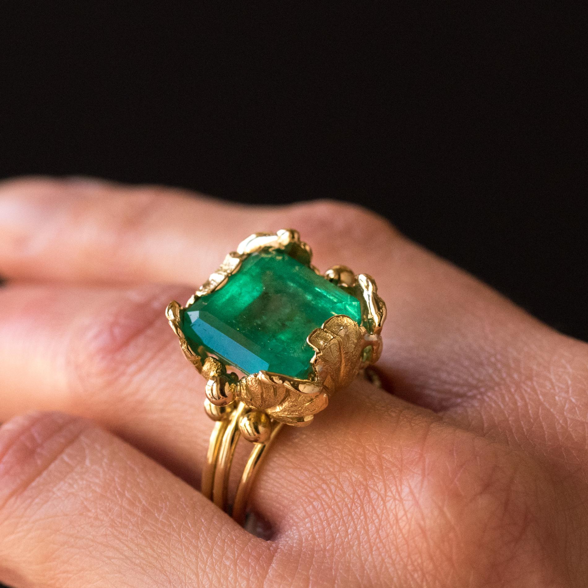 Women's 1960s 11.76 Carat Colombian Emerald Foliaged Setting 18 Karat Yellow Gold Ring