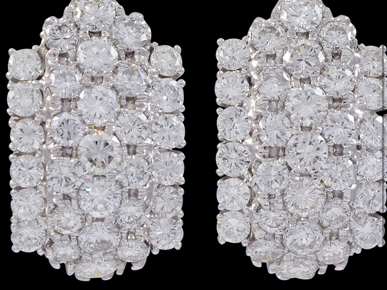 A fabulous pair of earrings with an enormous amount of look and sparkle!
These exquisite pair of earrings features  only round   diamonds of substantial size in 5 rows. 
 All diamonds  are set with the prongs , weighing approximately 12 carat total
