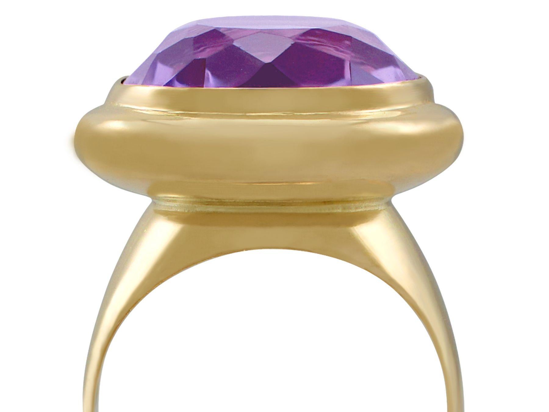 A fine and impressive vintage 13.53 carat amethyst and 18 karat yellow gold cocktail ring; part of our diverse gemstone jewelry and estate jewelry collections.

This fine and impressive amethyst and gold ring has been crafted in 18k yellow