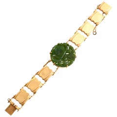 1960s 14 Karat Gold and Jade Bracelet