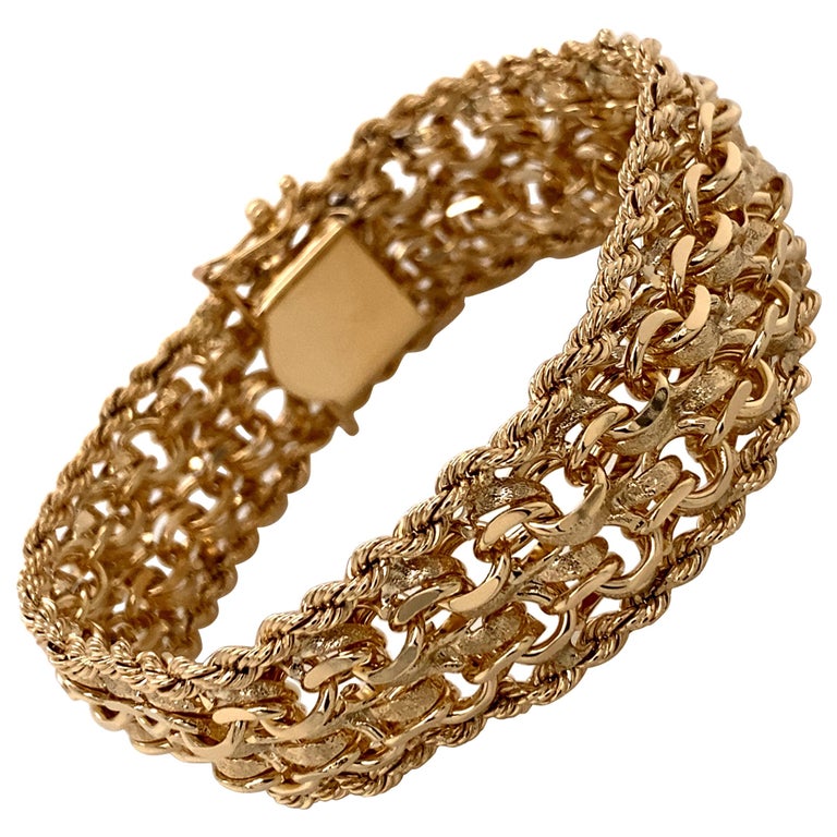 1960s 14 Karat Yellow Gold Wide Charm Bracelet