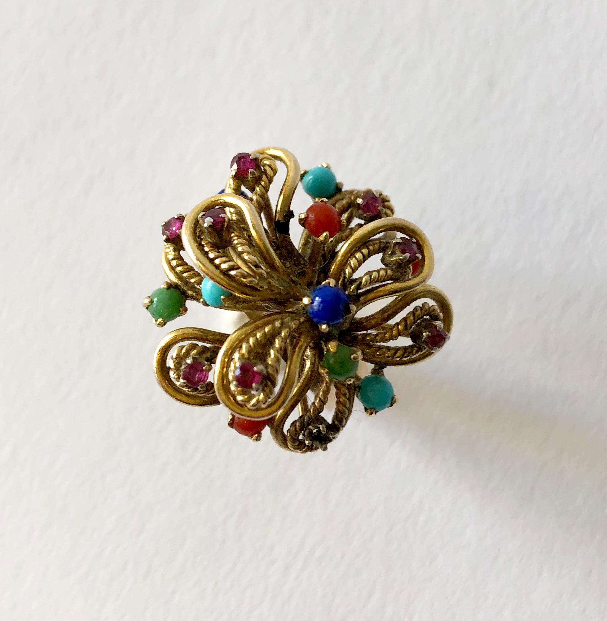 Multi gemstone ring set in 14K gold, possibly Italian circa 1960's.  Ring is a finger size 6  and is signed 14k.  In very good vintage condition.  10.9 grams.