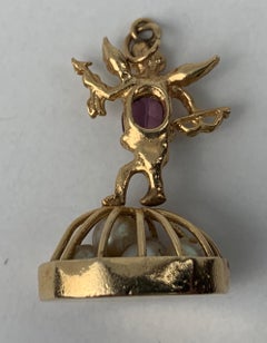 14 Karat Yellow Gold Angel on a Basket of Pearls