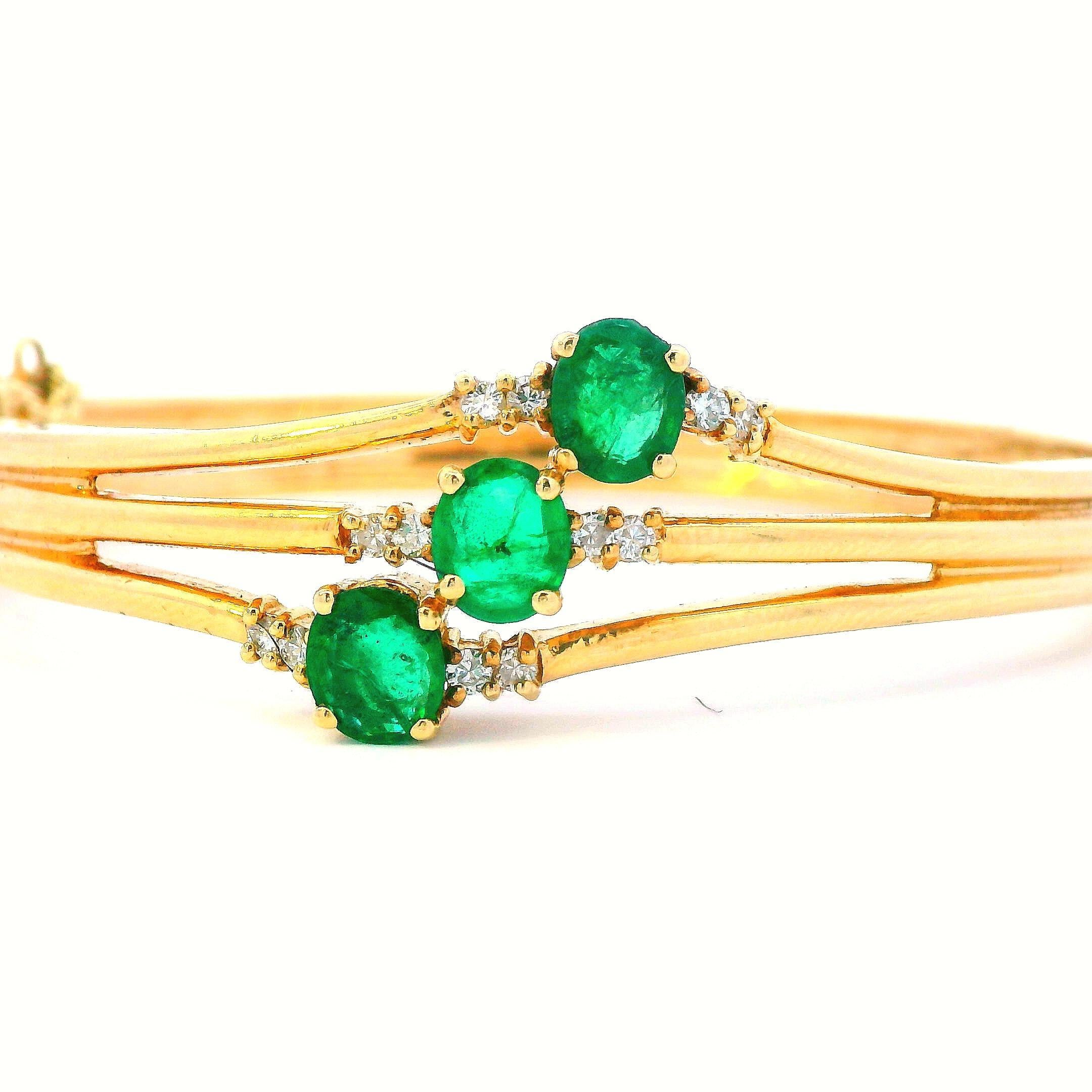 1960s 14k Yellow Gold Emerald and Diamond Bangle In Excellent Condition For Sale In Lexington, KY