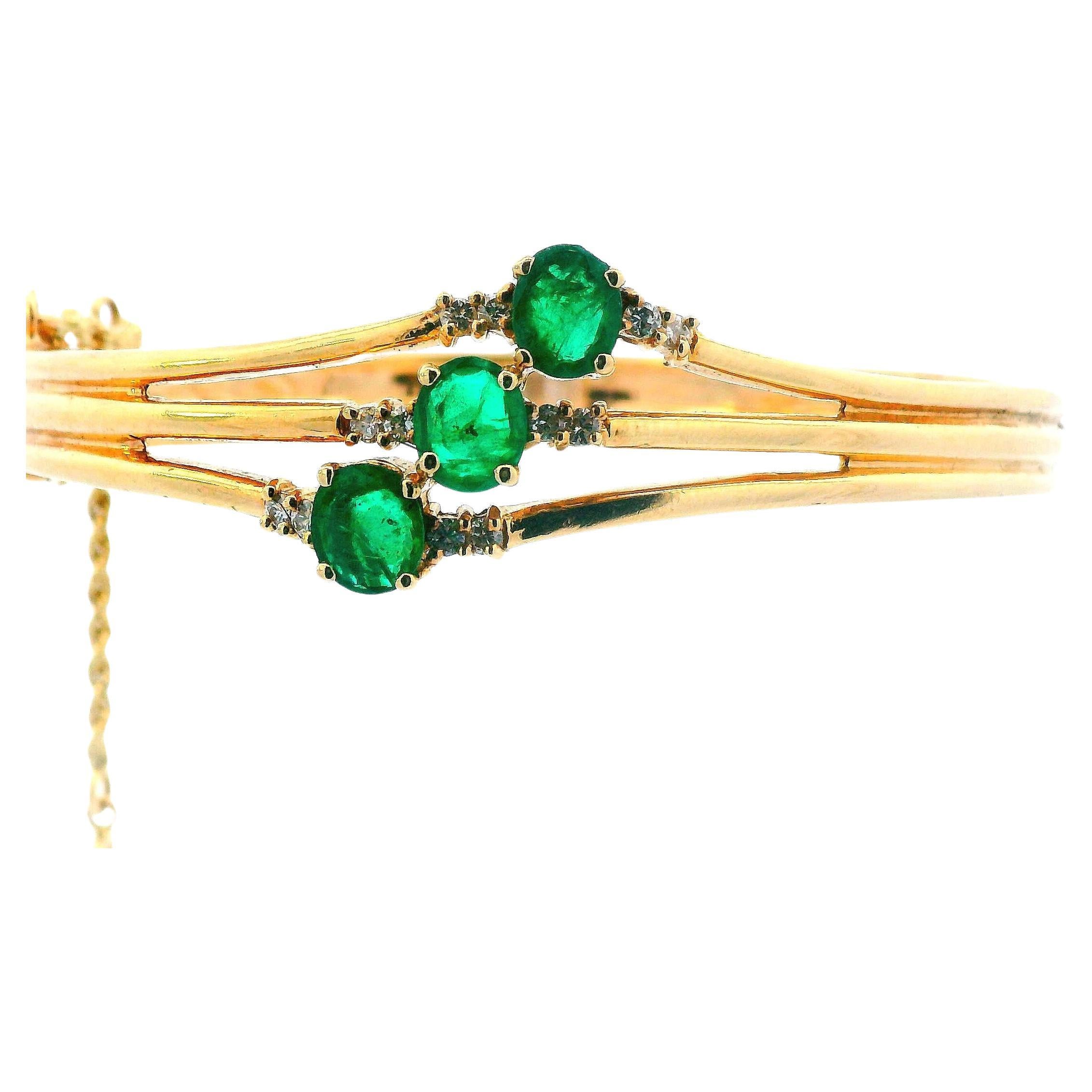 1960s 14k Yellow Gold Emerald and Diamond Bangle For Sale